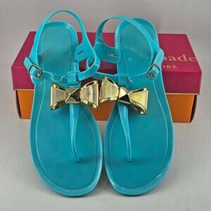 Kate Spade New York Fab turquoise Jelly gold Bow Sandals, 9